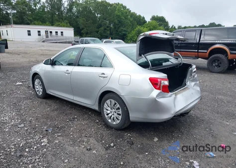 2014 Toyota Camry Le z USA, uszkodzony, nr VIN 4T4BF1FK9ER374713